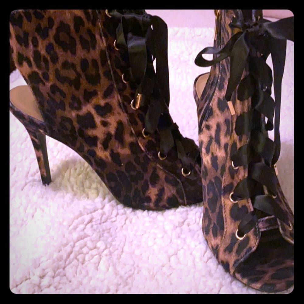 Cheetah print lace up heels. Brand new. Never worn
